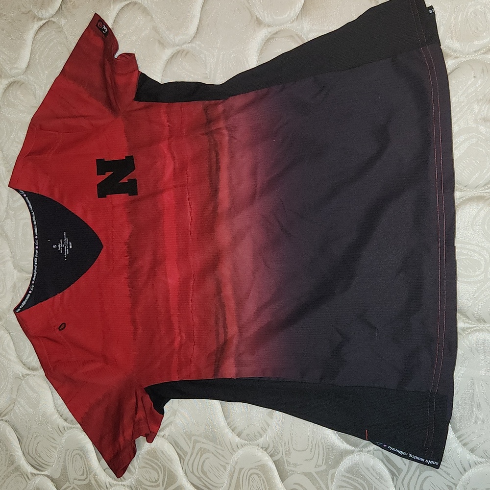Size small Nebraska Husker scrub top. Worn only a few times and  great condition